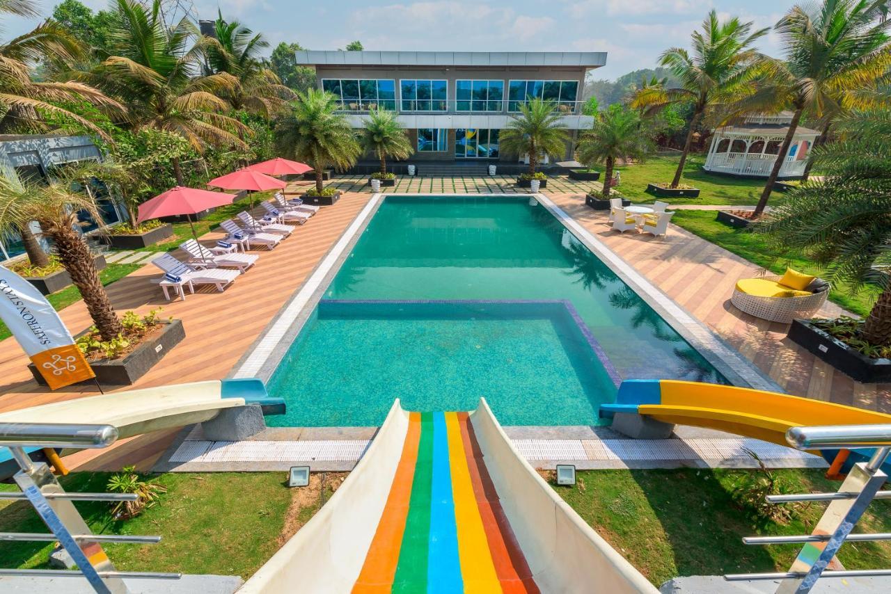 Saffronstays Palm Paradise, Kalyan Khadavli - Swimming Pool With Water Slides, Gazebo And Indoor Games Padghe Exterior foto