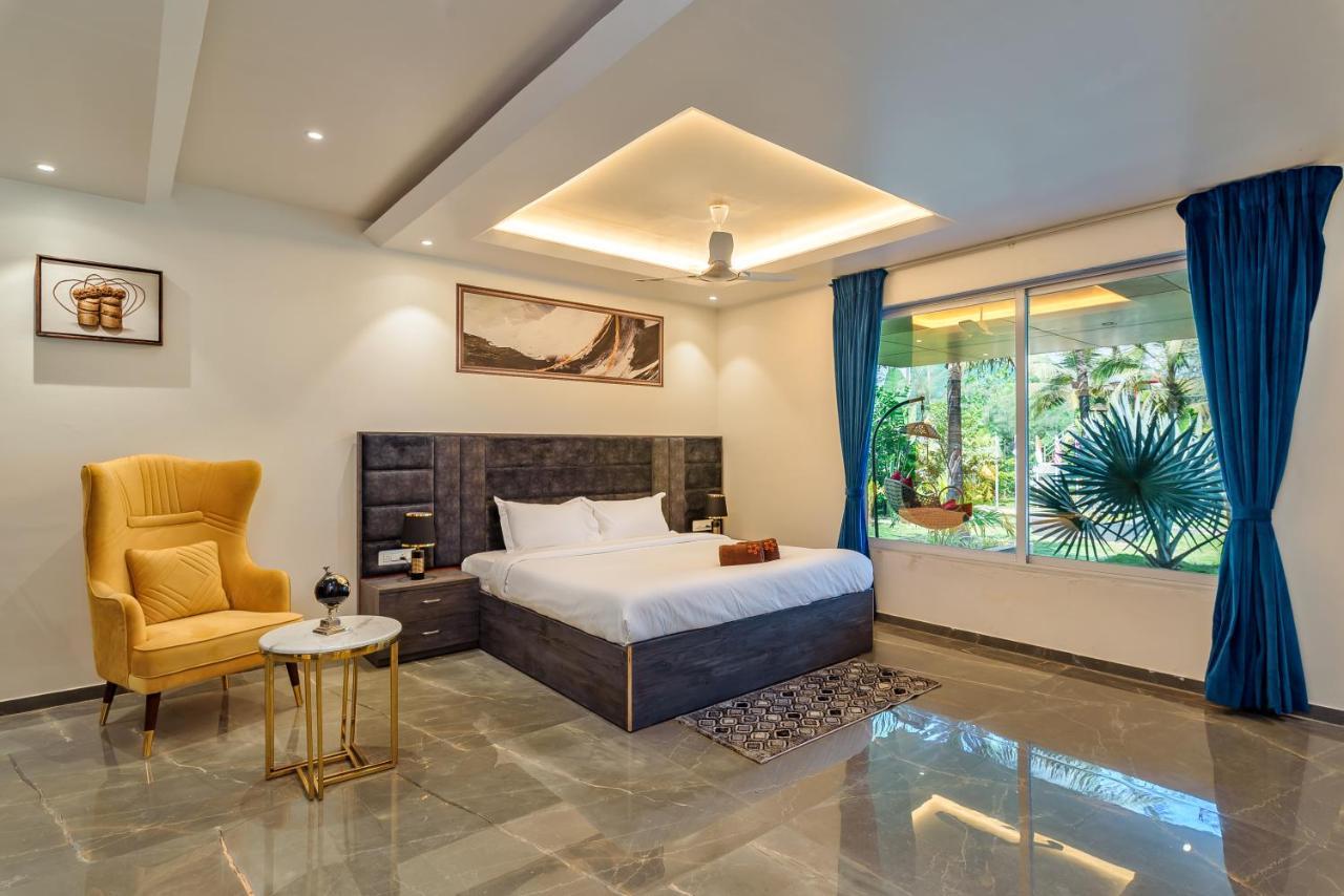 Saffronstays Palm Paradise, Kalyan Khadavli - Swimming Pool With Water Slides, Gazebo And Indoor Games Padghe Exterior foto